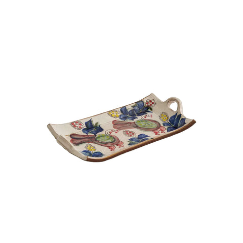 Decorative ceramic tray with floral patterns on a beige background