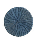 Blue woven round placemat on a beige background
